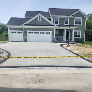 Driveway with 8" stamped and stained border